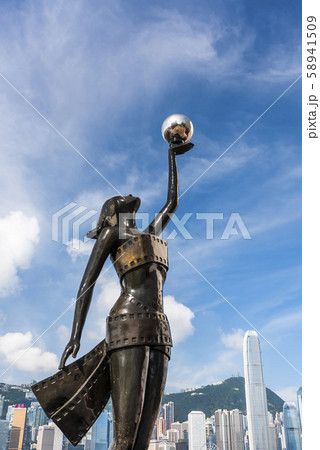 Tourists visiting the Avenue of the Stars. The Avenue of Stars is located along the Victoria Harbor in Hong Kong.  Tourists visiting the Avenue of the Stars. The Avenue of Stars is located along the Victoria Harbor in Hong Kong.  58941509