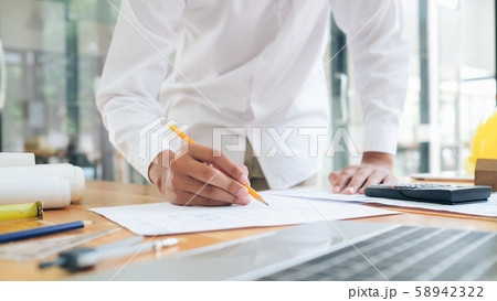 Architect or engineer working in office 58942322