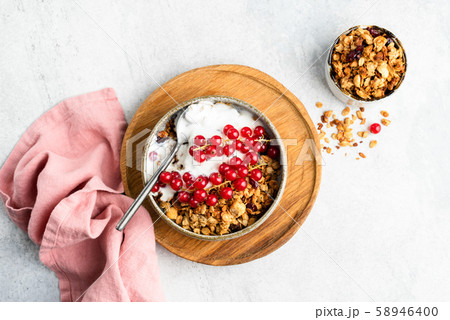 Breakfast cereal oat granola with yogurt and berries Breakfast cereal oat granola with yogurt and berries 58946400