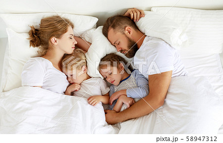 healthy sleep. happy family parents and children 58947312