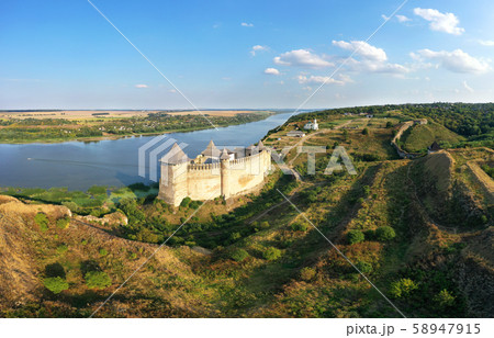 Aerial view of old castle near the River. Hotyn Castle in Ukraine. Eastern Europe. Aerial view of old castle near the River. Hotyn Castle in Ukraine. Eastern Europe. 58947915