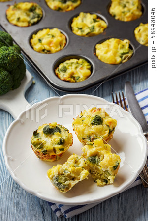 Vegetable muffins with broccoli and potatoes, vegetarian food. Vegetable muffins with broccoli and potatoes, vegetarian food. 58948046