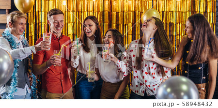 New Year party. Group of young people having fun New Year party. Group of young people having fun 58948432