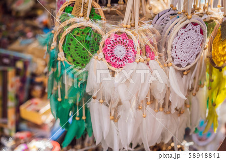 Typical souvenir shop selling souvenirs and handicrafts of Bali at the famous Ubud Market, Indonesia Typical souvenir shop selling souvenirs and handicrafts of Bali at the famous Ubud Market, Indonesia 58948841