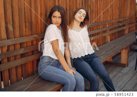 Two pretty girls in a summer park 58951423