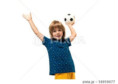 Picture of a teenage caucasian boy holds a soccer ball in one hand isolated on white background Picture of a teenage caucasian boy holds a soccer ball in one hand isolated on white background 58959077