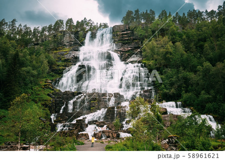 Voss, Hordaland, Norway. Waterfall Tvindefossen In Spring. Largest And Highest Waterfall Of Norway 58961621