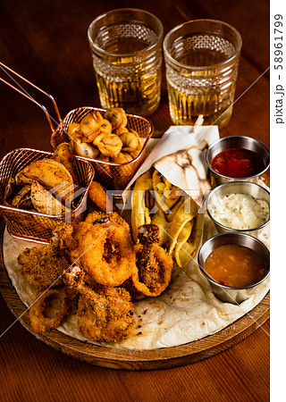 beer plate on the wooden background beer plate on the wooden background 58961799