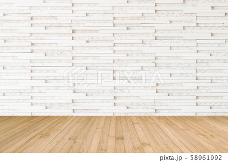 Modern marble tile wall pattern textured background in light white beige color with wooden floor in yellow brown tone 58961992