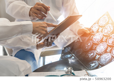 ER surgery medical team, surgical doctor teamwork, professional brain and neurological surgeon with digital tablet working in hospital clinic discussion, diagnosing on patient care operation service 58963200