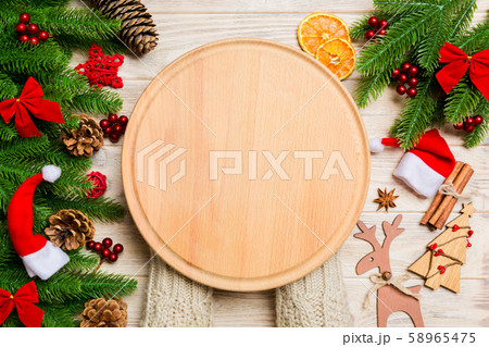Top view of female hand holding a plate on holiday Top view of female hand holding a plate on holiday 58965475