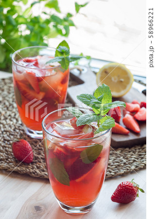 Homemade iced tea with strawberries and mint Homemade iced tea with strawberries and mint 58966221