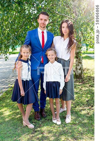 Parents brings theiir little cute daughter to school. Adorable little girl feeling very excited 58966866
