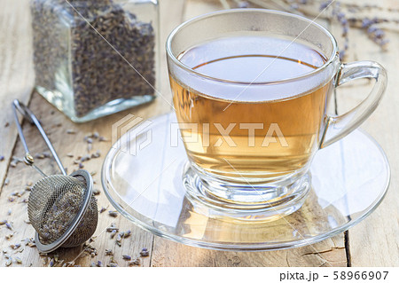 Healthy herbal lavender tea in glass cup Healthy herbal lavender tea in glass cup 58966907