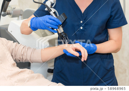 Laser Skin Rejuvenation on female arms and hands Laser Skin Rejuvenation on female arms and hands 58968965