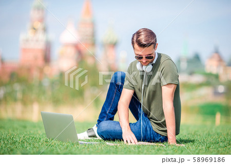 Happy young urban man enjoy his break in the city 58969186