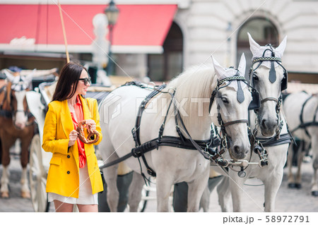 Tourist girl enjoying her european vacation in Vienna Tourist girl enjoying her european vacation in Vienna 58972791