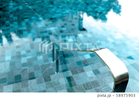 Grab bars stainless in the pool 58975903