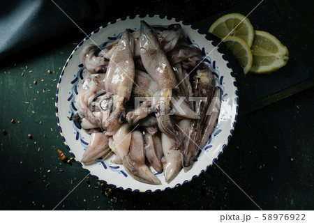 raw squids in a bowl raw squids in a bowl 58976922