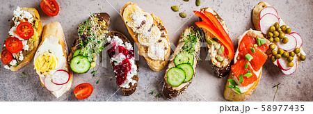 Open toasts with different toppings Open toasts with different toppings 58977435