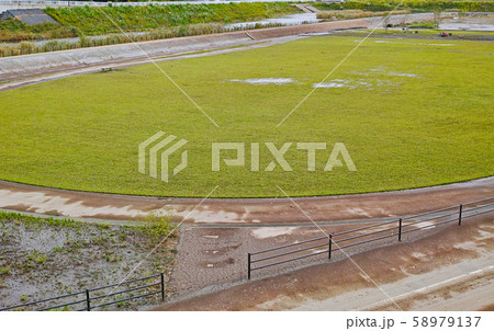 台風の大雨で流入した水が引いた後の境川遊水地公園の今田遊水地 台風の大雨で流入した水が引いた後の境川遊水地公園の今田遊水地 58979137
