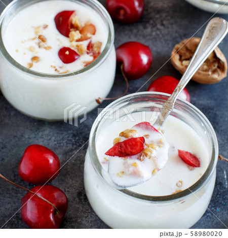 Fermented yogurt kefir in small bottles with Fermented yogurt kefir in small bottles with 58980020