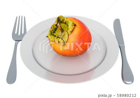Persimmon on plate with fork and knife Persimmon on plate with fork and knife 58980212