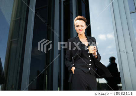 Modern business woman in the office with copy space Modern business woman in the office with copy space 58982111
