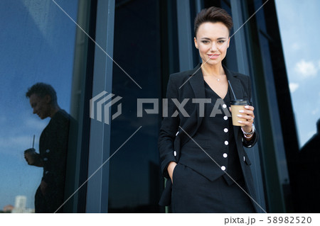 portrait of a successful businesswoman on the background of a skyscraper 58982520