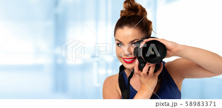 Woman shoots photos 58983371