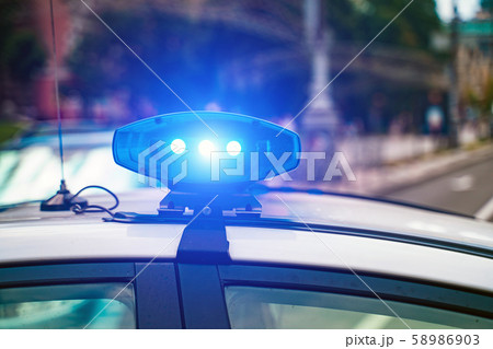 Close-up of flashing lights on a police car. Close-up of flashing lights on a police car. 58986903