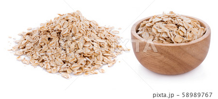 Oat flakes pile isolated on white background 58989767