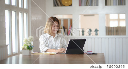 Portrait of young female professional designer Portrait of young female professional designer 58990846