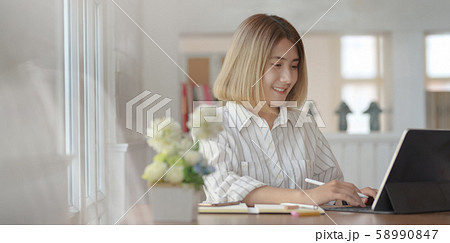Portrait of young female professional designer Portrait of young female professional designer 58990847