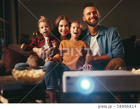 family mother father and children watching family mother father and children watching 58996814