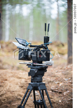 Camera is standing in the middle of the forest 58997007