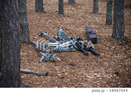 Movie equipment is lying on autumn leaves 58997044