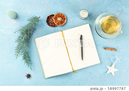 New Year resolutions, flat lay top shot with copyspace, on a blue background with Christmas 58997787