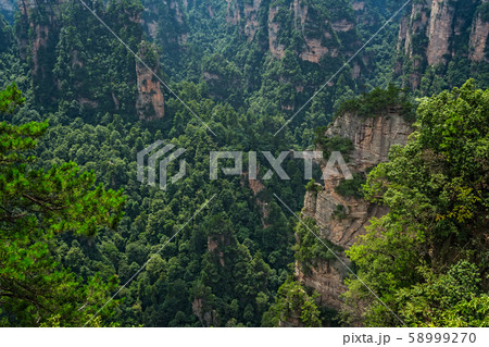 Vertical karst pillar rock formations seen from Vertical karst pillar rock formations seen from 58999270