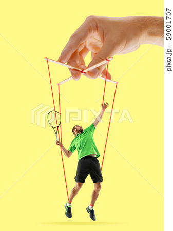 Man like a puppet in somebodies hands. Concept of manipulation 59001707
