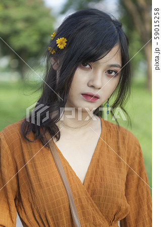 Asian young woman in the park Asian young woman in the park 59015258