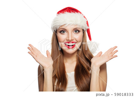 Christmas woman wearing Santa hat isolated Christmas woman wearing Santa hat isolated 59018333
