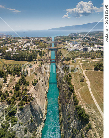 Aerial bird's eye view photo taken by drone of famous Corinth Canal with turquoise water Aerial bird's eye view photo taken by drone of famous Corinth Canal with turquoise water 59018590