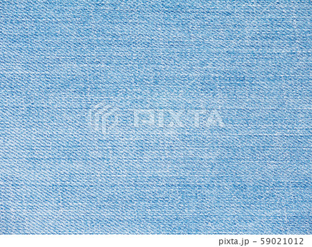 Light blue washed faded denim fabric texture swatch Stock Photo - 97992476