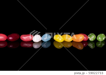 Jelly bean candy isolated on black glass 59022733