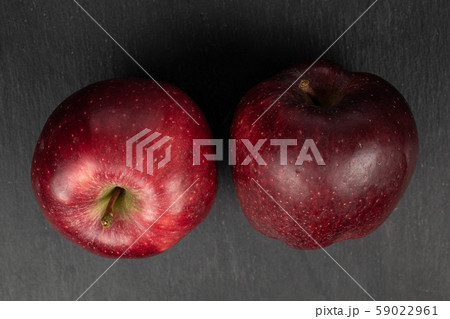 Red delicious apple on grey stone Red delicious apple on grey stone 59022961