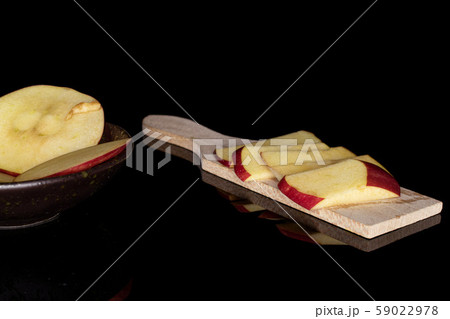 Red delicious apple isolated on black glass 59022978