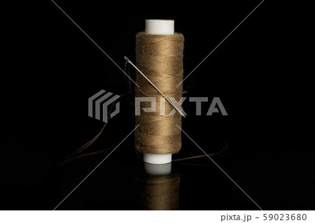 Haberdashery item isolated on black glass Haberdashery item isolated on black glass 59023680