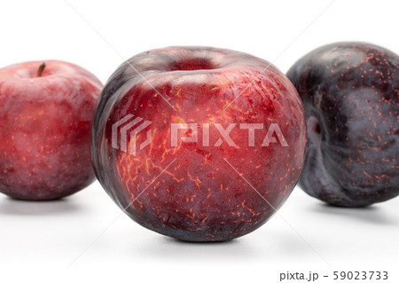 Fresh red plum isolated on white Fresh red plum isolated on white 59023733