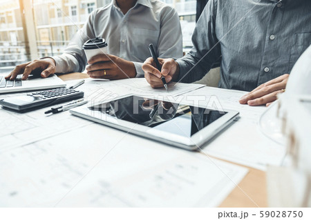 Engineer meeting for architectural with tablet 59028750